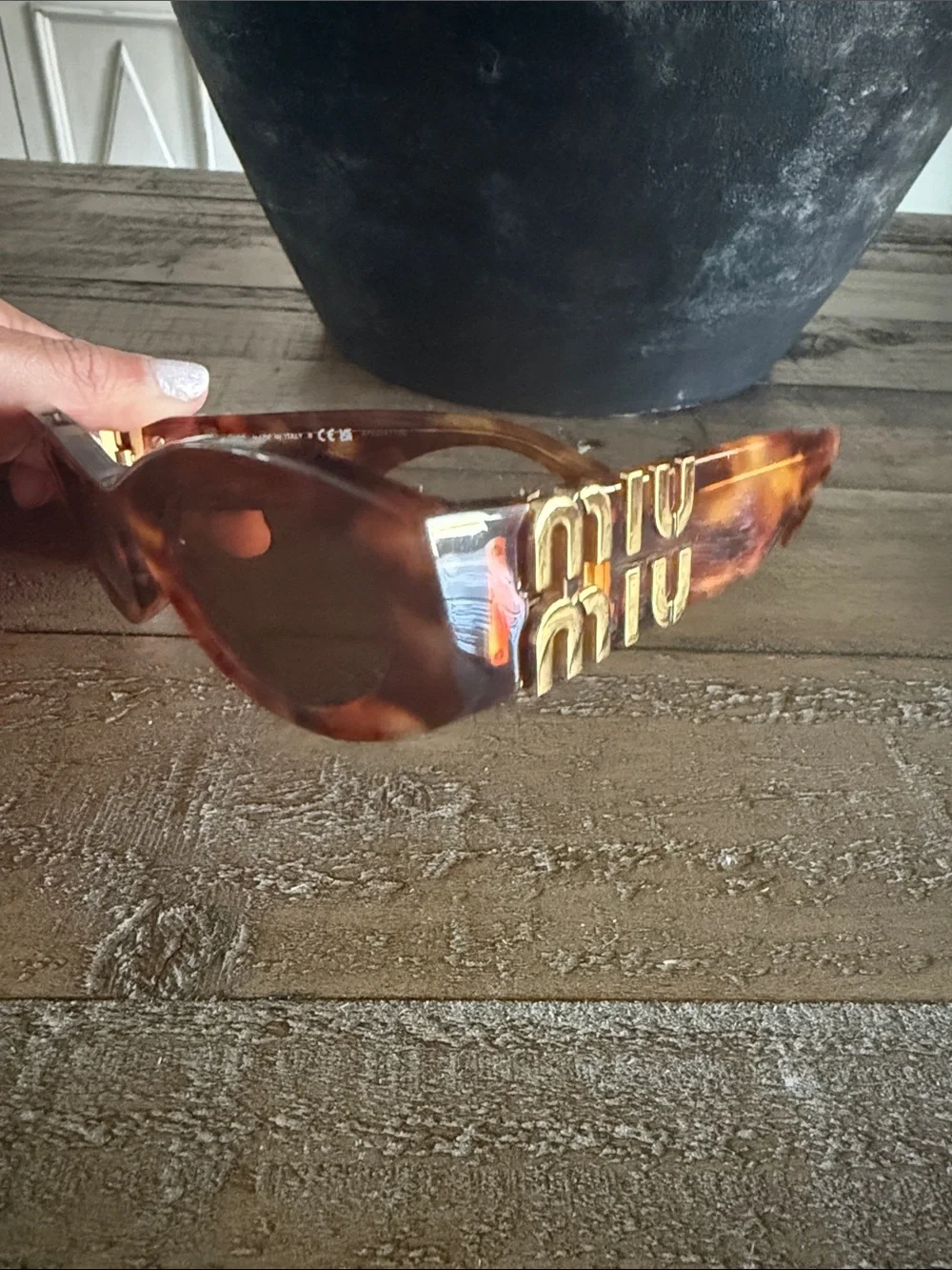 Miu Miu Tortoiseshell Cat-Eye Sunglasses with Gold Logo Accents